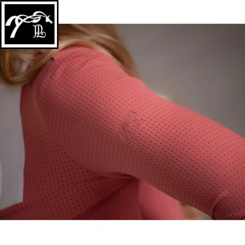 Polo de concours Florence micro perforé terracotta manches longues PENELOPE COLLECTION 987922 détail manche SELLERIE EQUINOXE SHOP FUVEAU