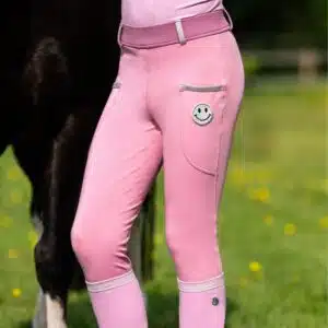 Legging d'équitation enfant Rosalynn Jr full grip QHP 8915 SS26 Sellerie Equinoxe Shop rose smiley Legging d'équitation enfant Rosalynn Jr full grip QHP 8915 SS26 Sellerie Equinoxe Shop rose smiley