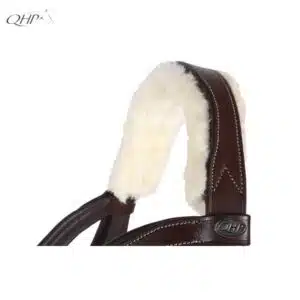 Bridon Ontario QHP – détail de la têtière anatomique amovible Têtière anatomique amovible du Bridon Ontario QHP avec fermeture velcro