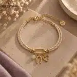 Bracelet Epona EQUESTRIAN SHOP – perles et pendentifs Bracelet Epona EQUESTRIAN SHOP avec fer à cheval, cœur et pierre naturelle, bijou équestre élégant pour femme
