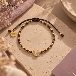 Bracelet Summer EQUESTRIAN SHOP coloris chocolat avec fer à cheval serti de strass et perles dorées