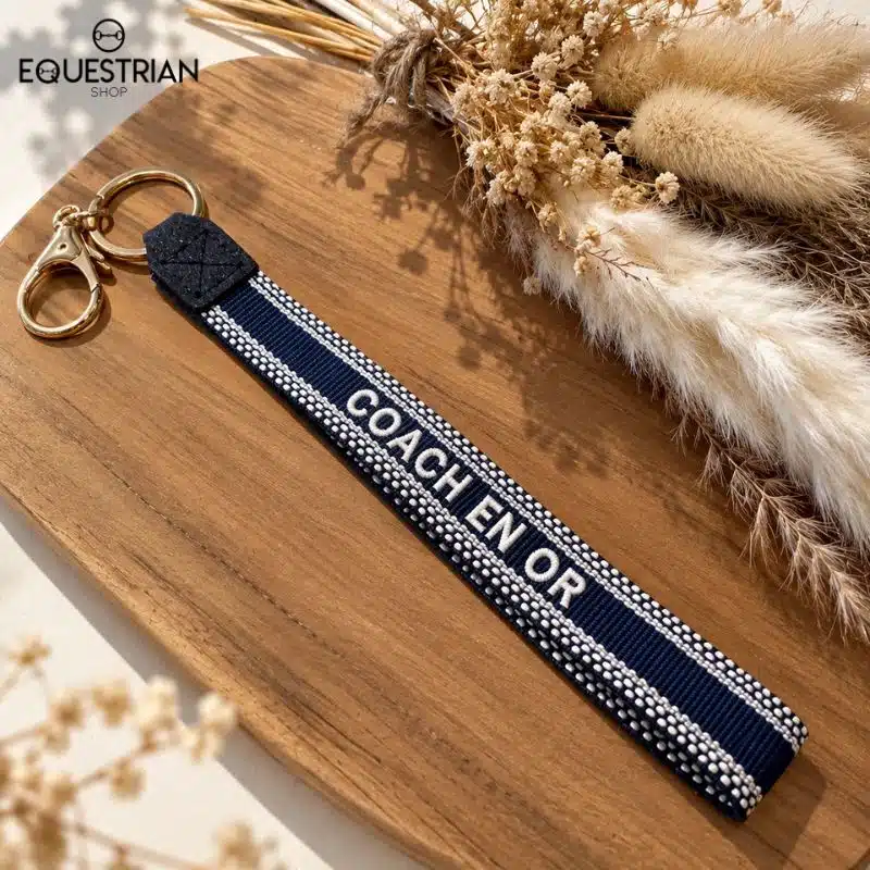 Porte-clés Coach en Or EQUESTRIAN SHOP coloris marine avec inscription brodée et anneaux dorés